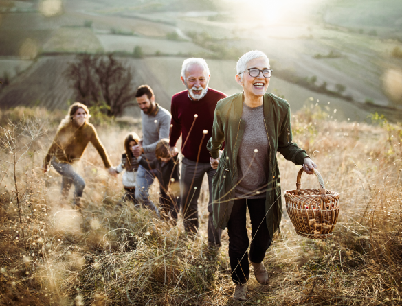family walking through a field