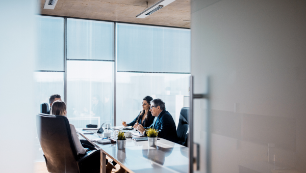 people sitting in board room