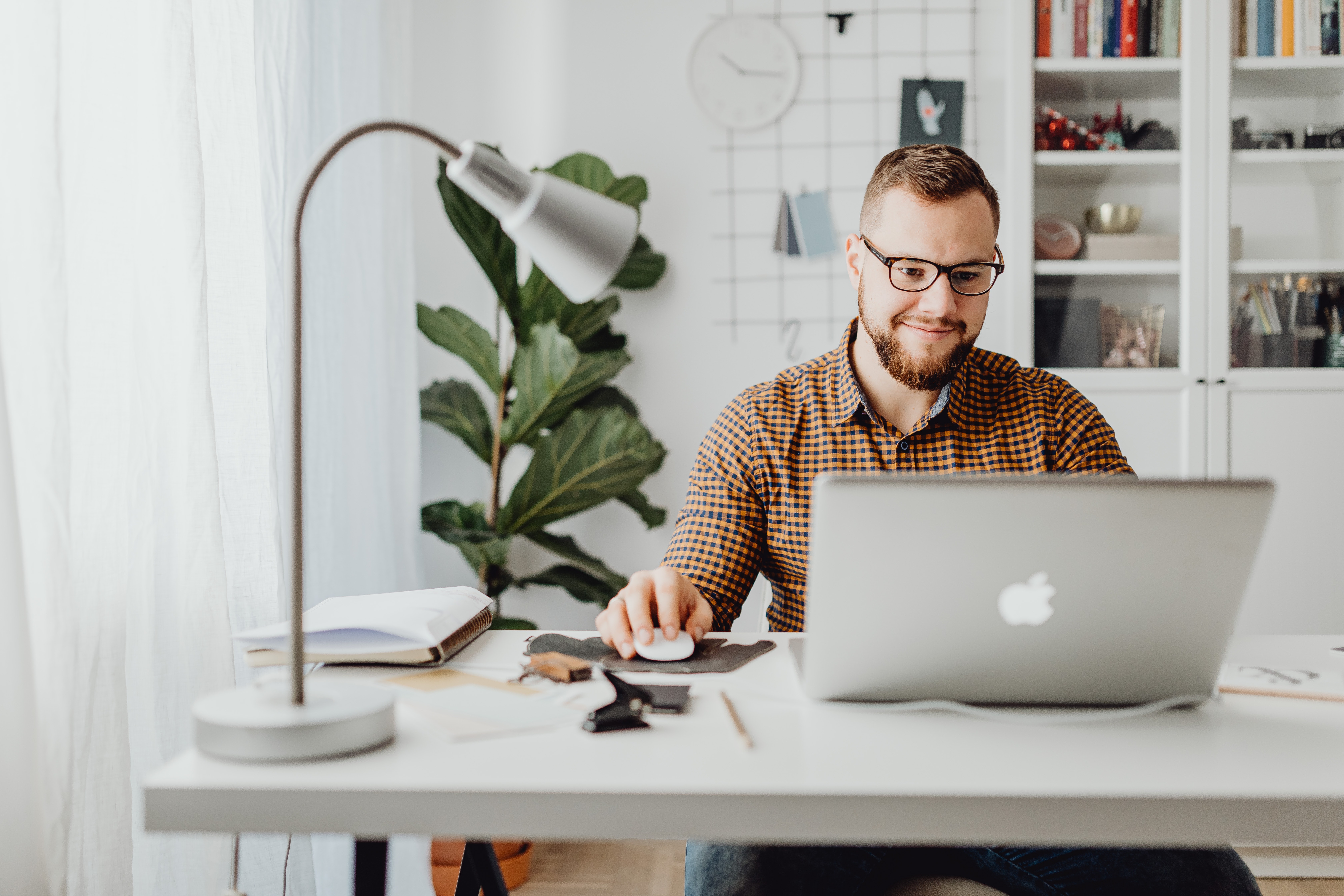 A gentleman working on his laptop