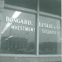 Bongard, Leslie & Co. name painted on an office window.
