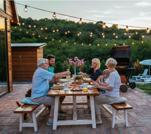 family having a meal at a picnic table