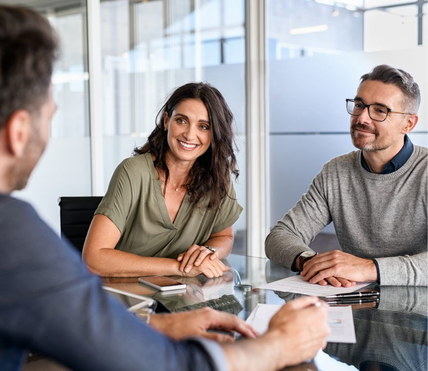 Clients sitting in an Investment Advisor's office