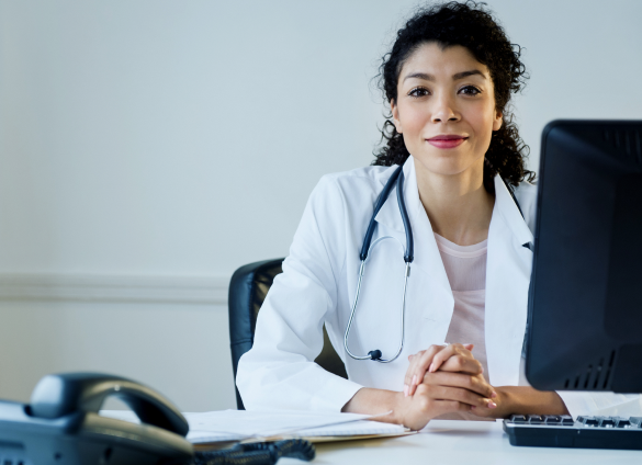 doctor sitting at a desk