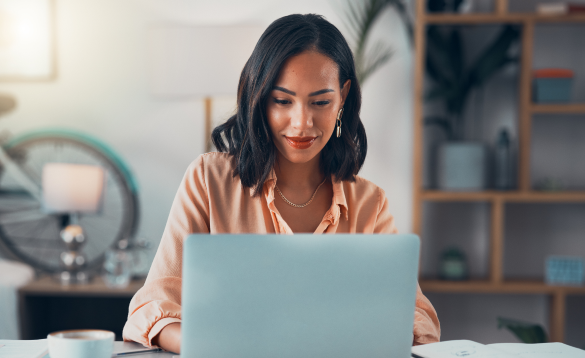 woman typing on a laptop