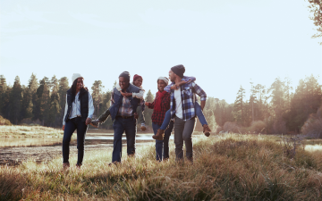 family walking in field